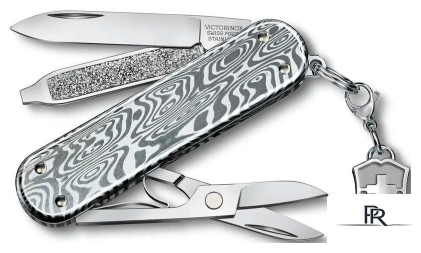 Мультитул Victorinox Classic Brilliant Damast 0.6221.34 (серебристый) - Изображение №1 — Интернет-магазин ПроЗаказ