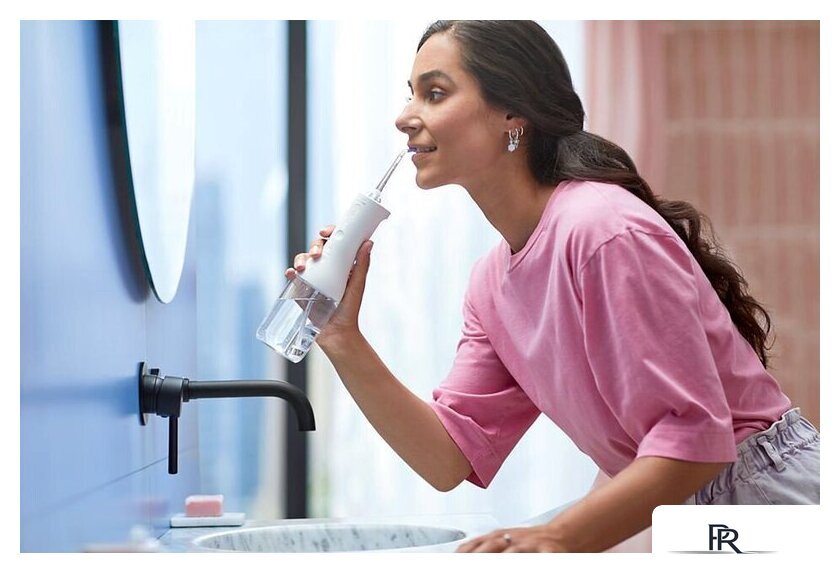 Электрическая зубная щетка и ирригатор Philips Sonicare Cordless Power Flosser HX3886/41 - Изображение №4 — Интернет-магазин ПроЗаказ
