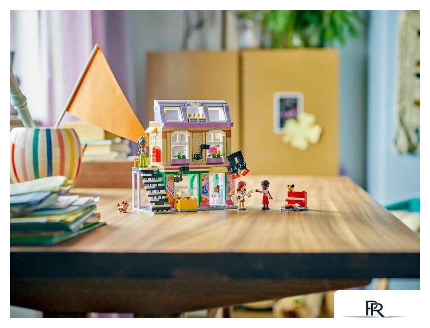 Конструктор LEGO Friends Музыкальный магазин и квартира 42653 - Изображение №11 — Интернет-магазин ПроЗаказ