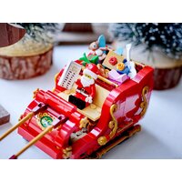 Конструктор LEGO 40499 Сувенирный набор Сани Деда Мороза - Превью изображения №19 — Интернет-магазин ПроЗаказ