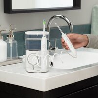 Электрическая зубная щетка и ирригатор Waterpik CC-04 (белый) - Превью изображения №13 — Интернет-магазин ПроЗаказ