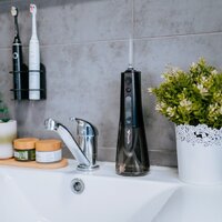 Ирригатор  TrueLife AquaFloss Compact L100 (черный) - Превью изображения №11 — Интернет-магазин ПроЗаказ